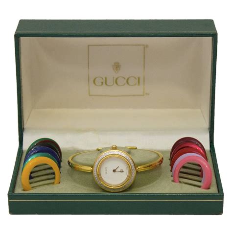 gucci watch interchangeable bezel.